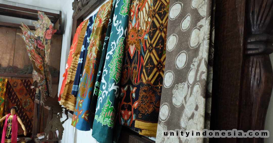 Colourful batik fabrics in a shop.