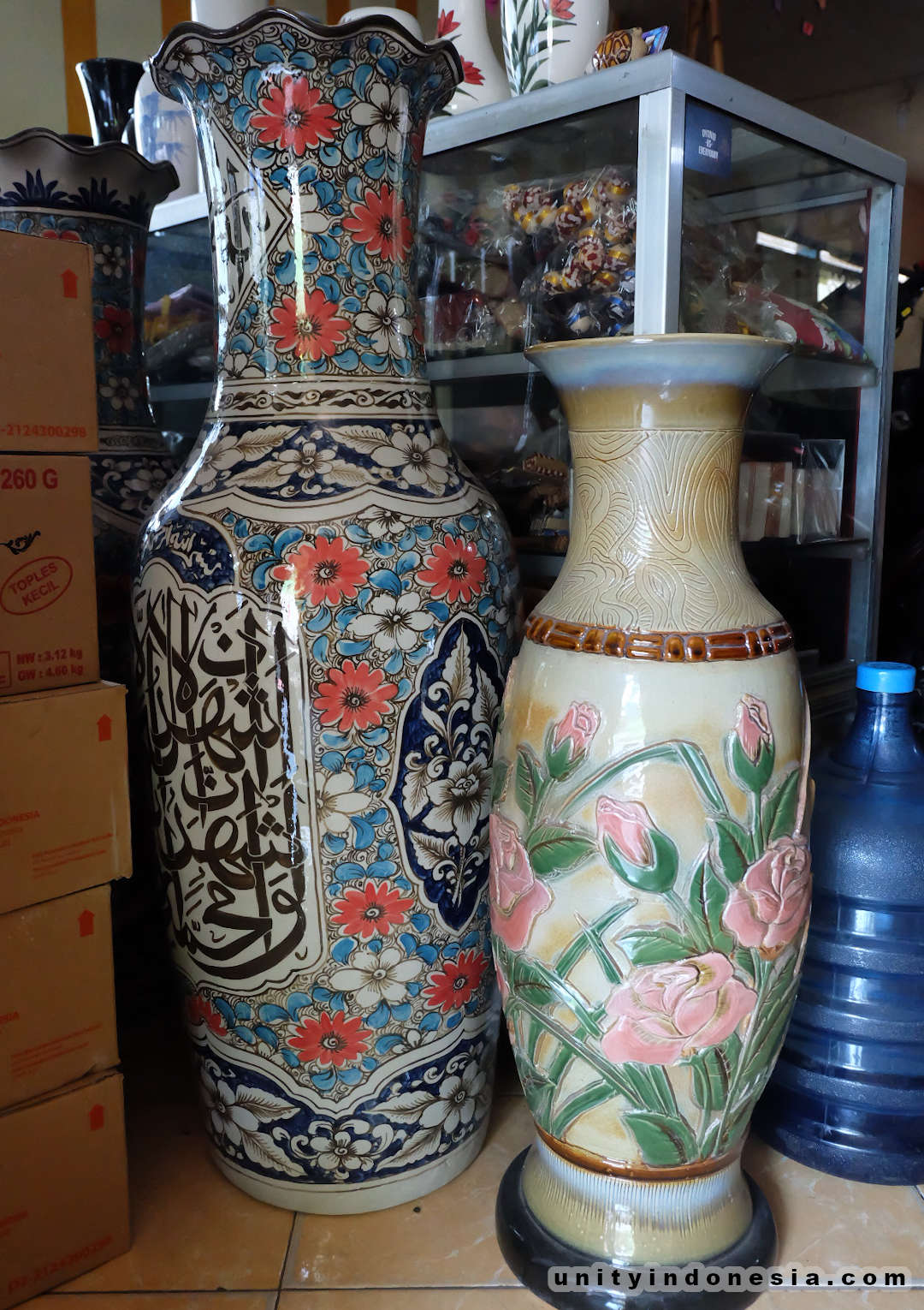 Indonesian pottery, tall vases with drawings.