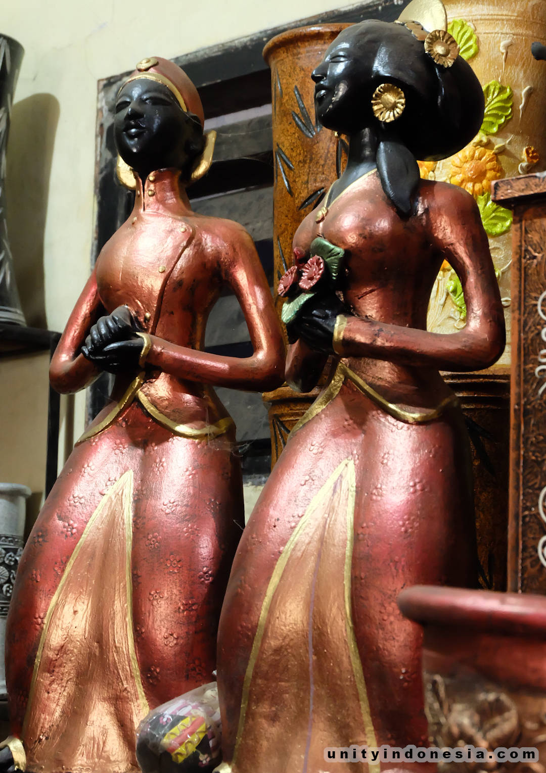 Traditional indonesian wedding girl statues.